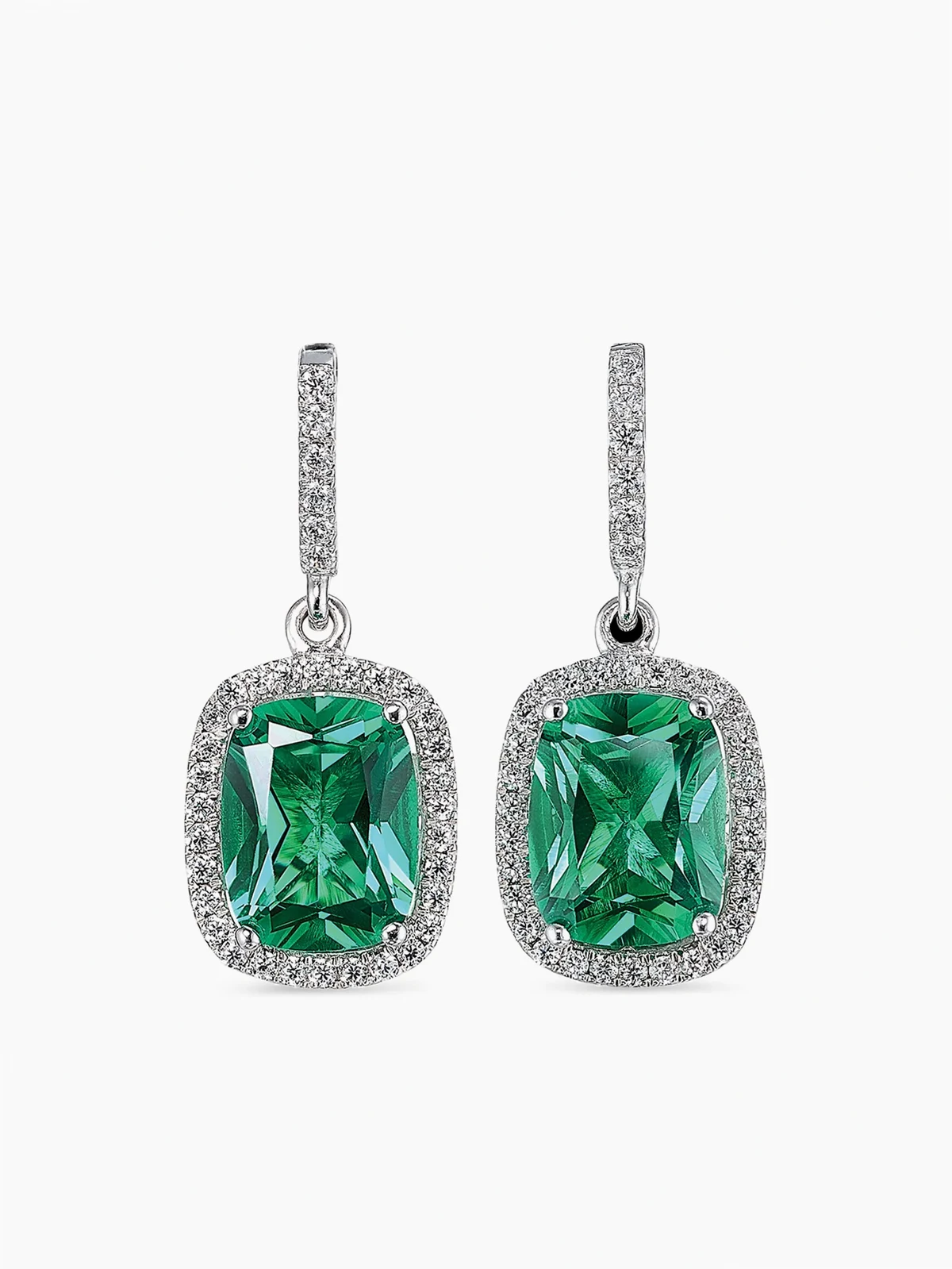 18kt white gold Comet emerald earrings