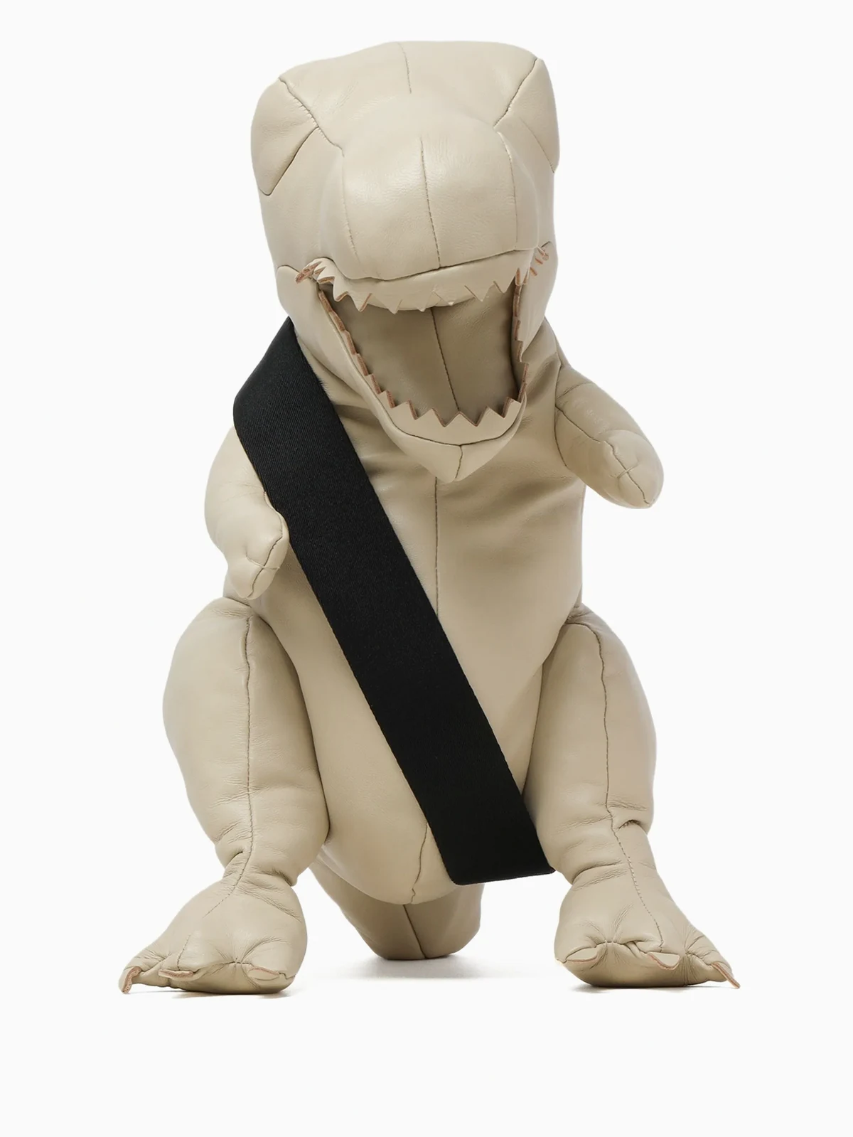dinosaur-shaped leather messenger bag