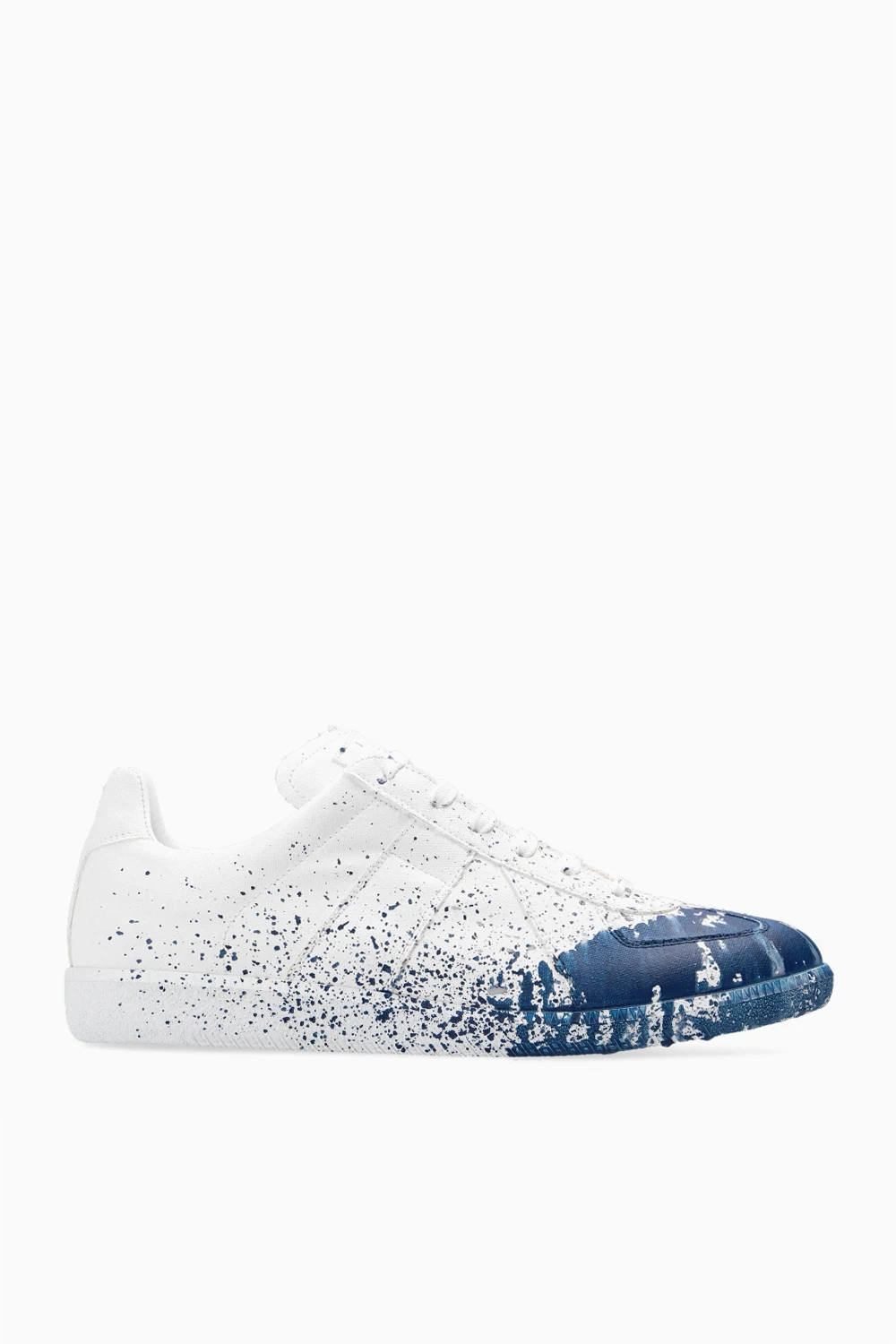 Buty sportowe z motywem farby
