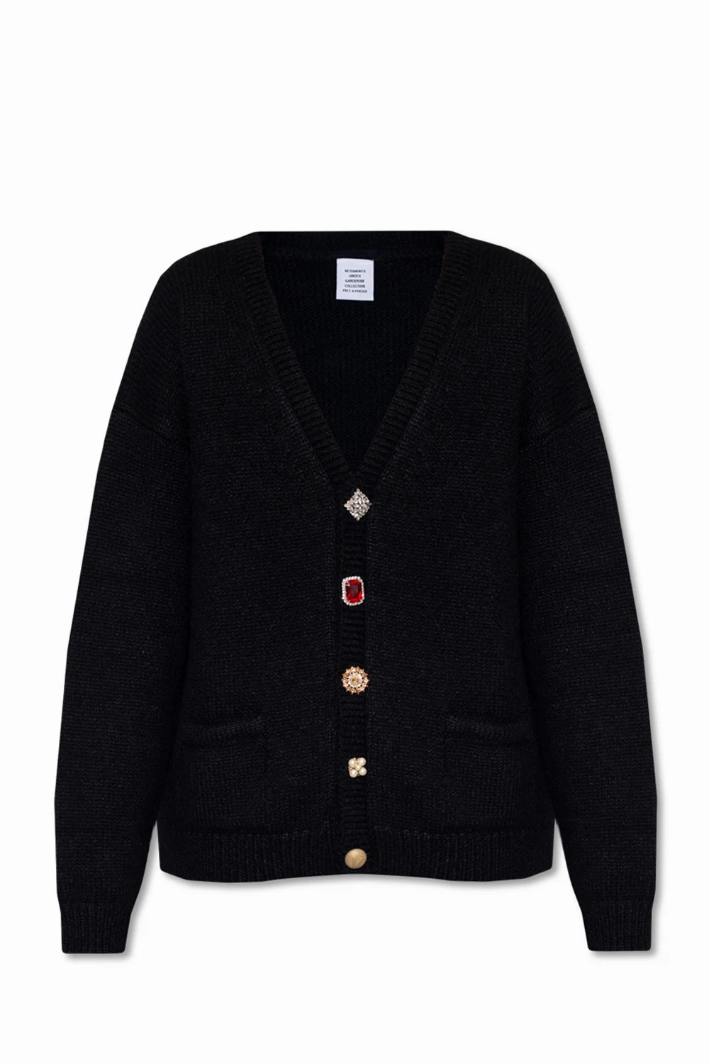 Cardigan with decorative closure