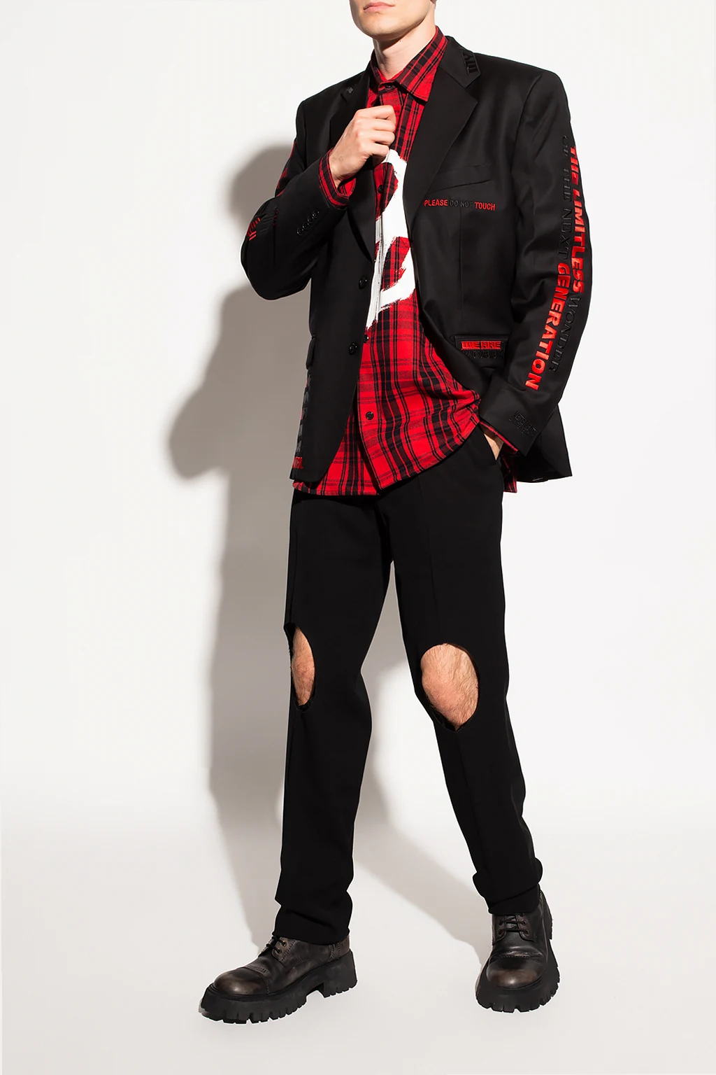 Trousers with cut-outs