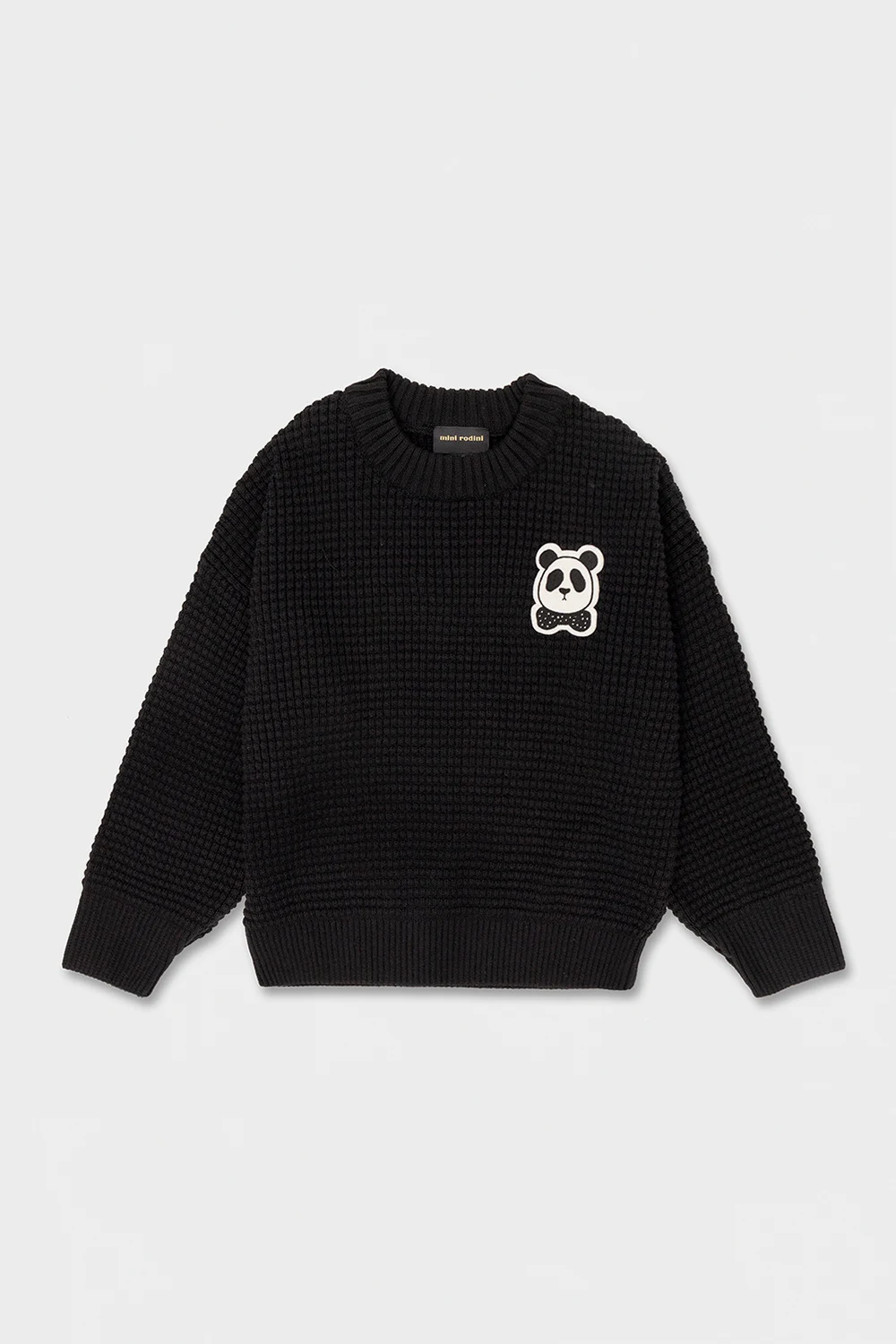 Sweater with patch