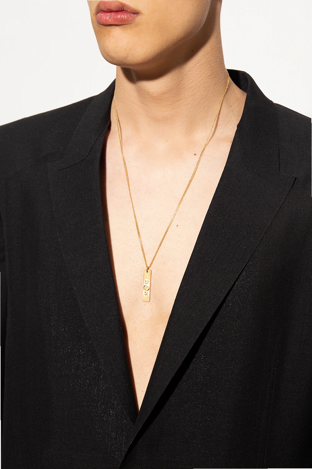 Silver-tone necklace with charm
