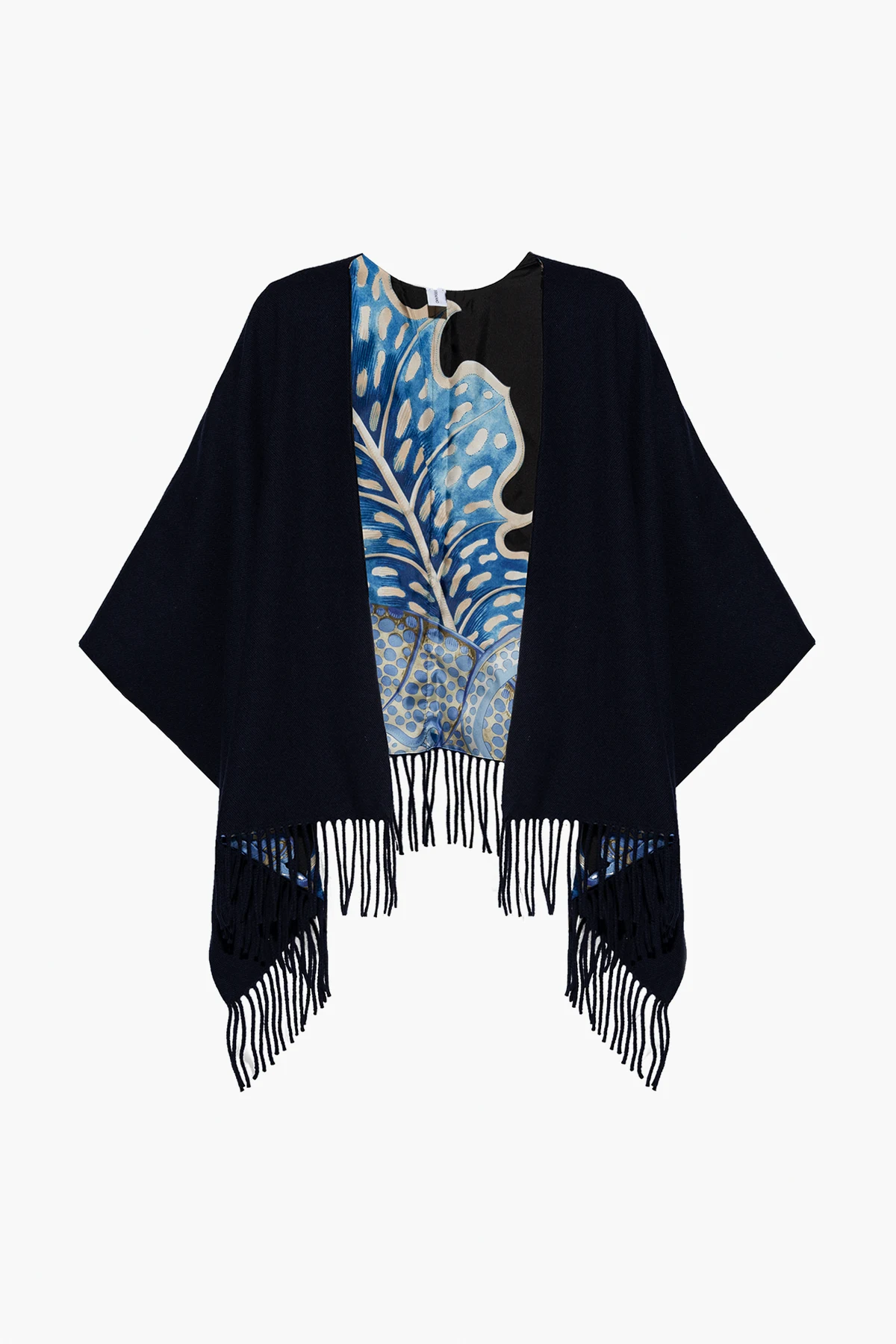 Reversible poncho with fringes