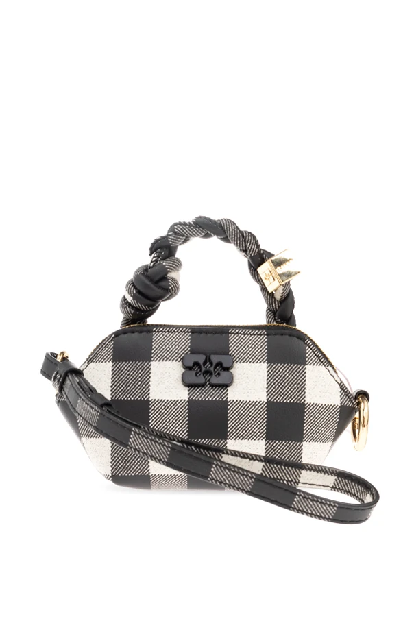 SCHWARZ Eine Tasche mit einer Anwendung in Form des Logos