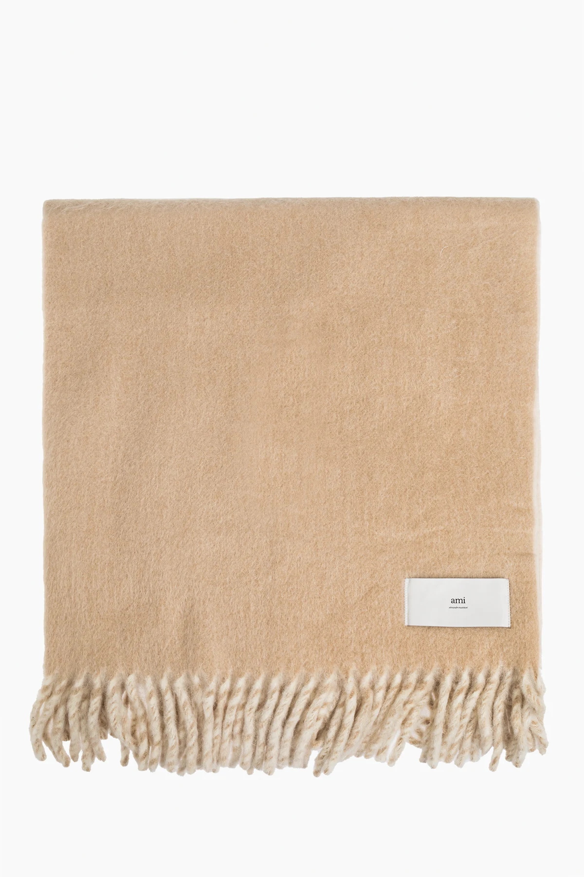 Wełniany koc z frędzlami