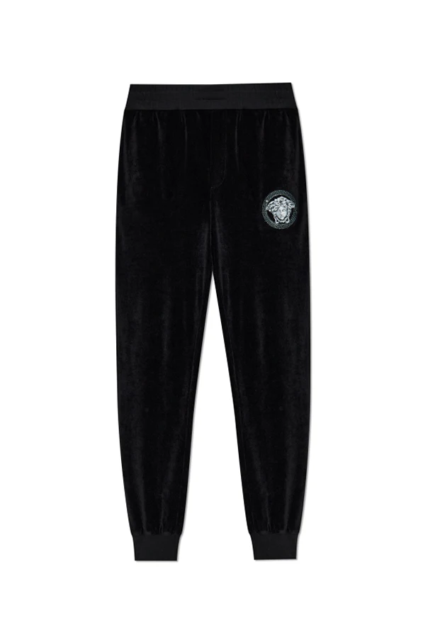 BLACK Velvet trousers with a shimmering appliqué