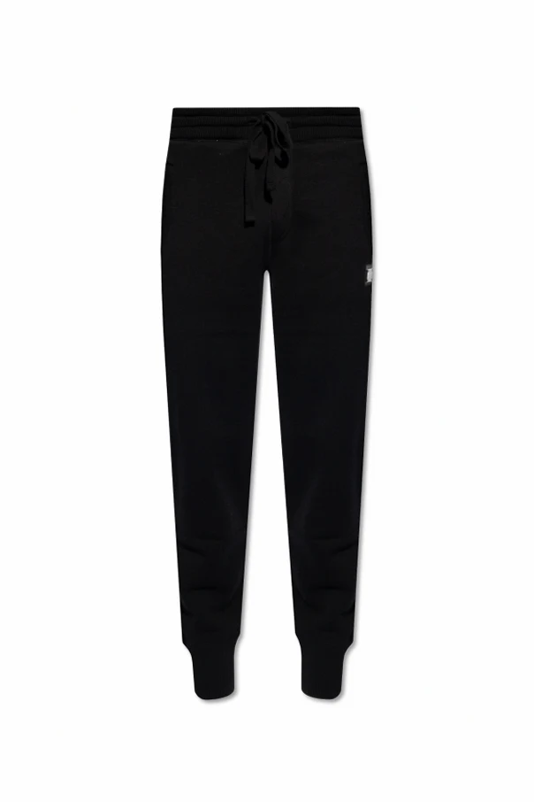 SCHWARZ Wool trousers with logo