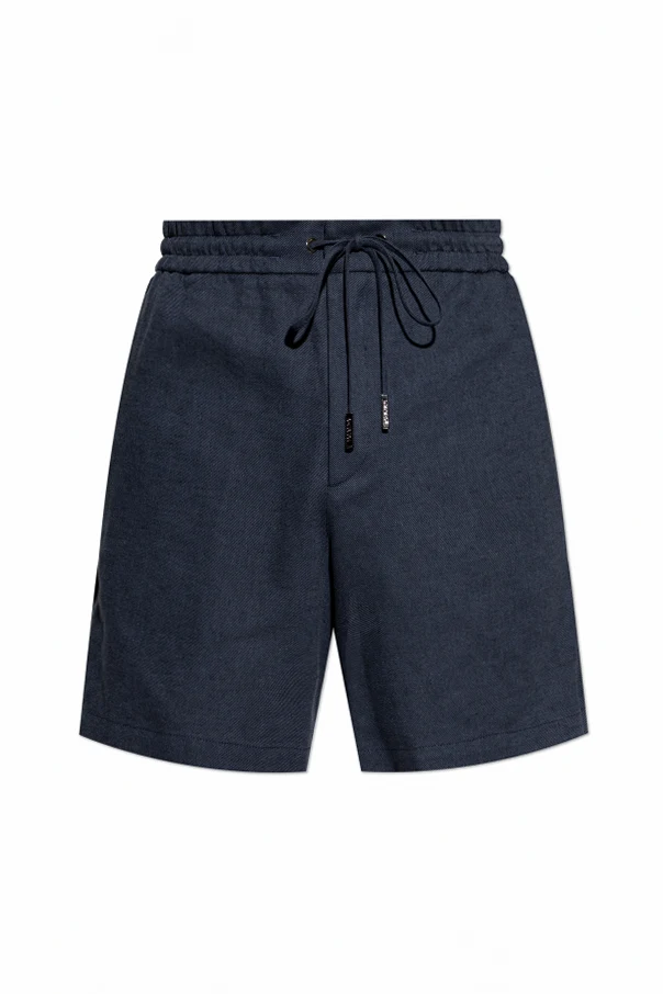 NAVY BLUE Shorts with an applique on the pocket