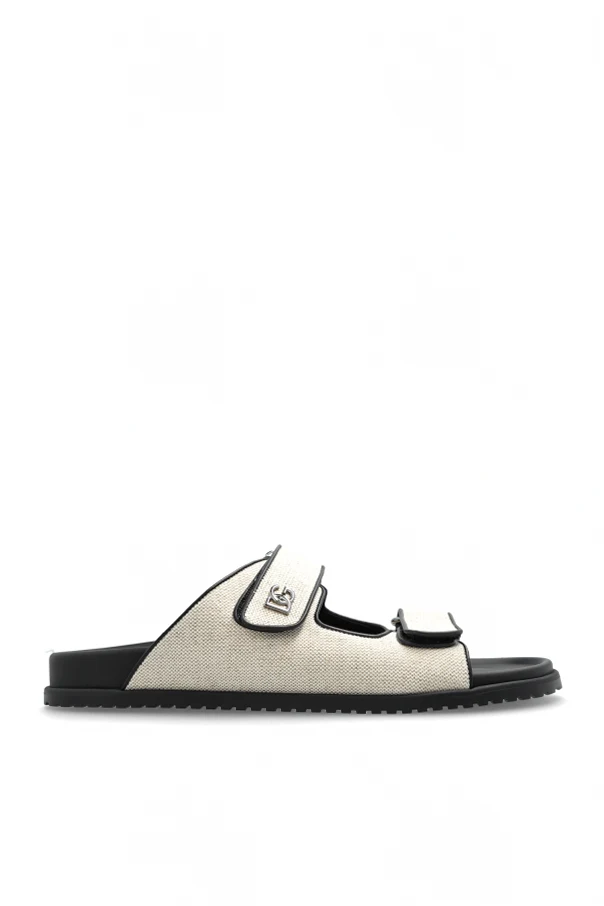 cream Slides with a logo-shaped appliqué