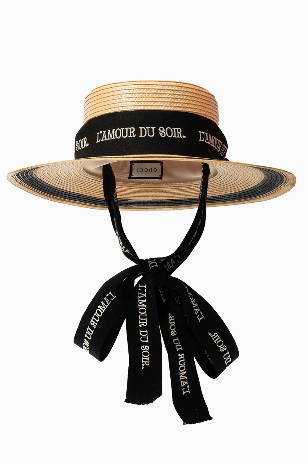 Hat with ribbon closure
