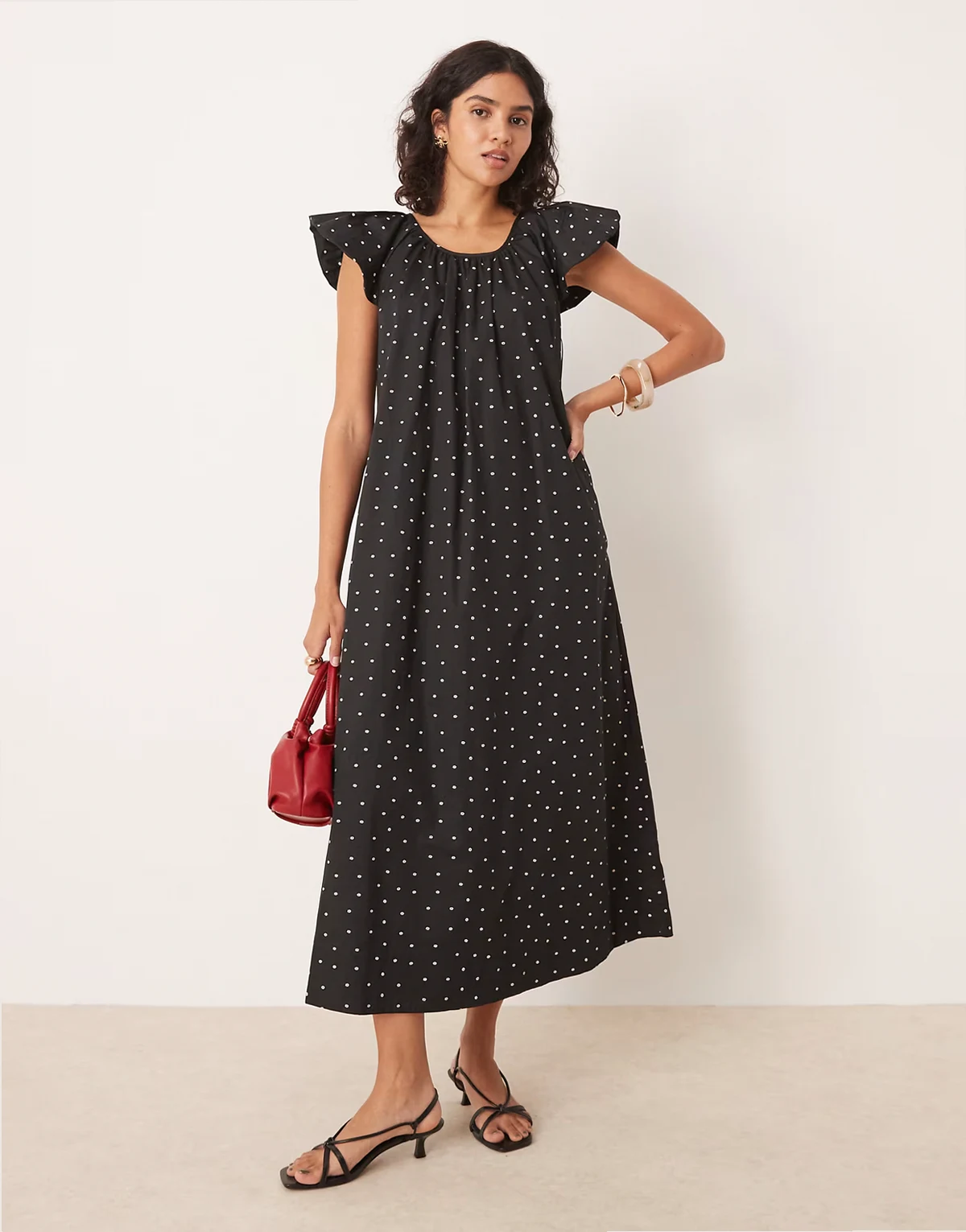 – Midikleid in Schwarz mit Punktemuster