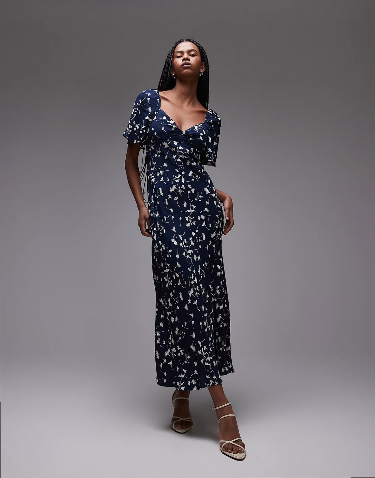 puff sleeve midaxi dress with twist sweetheart neckline in blue abstract print