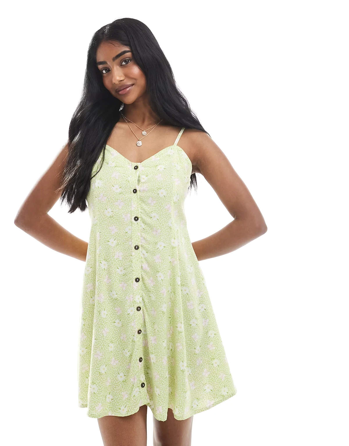 – Gesponnenes Minikleid mit grünem Blumenmuster und Knopfleiste