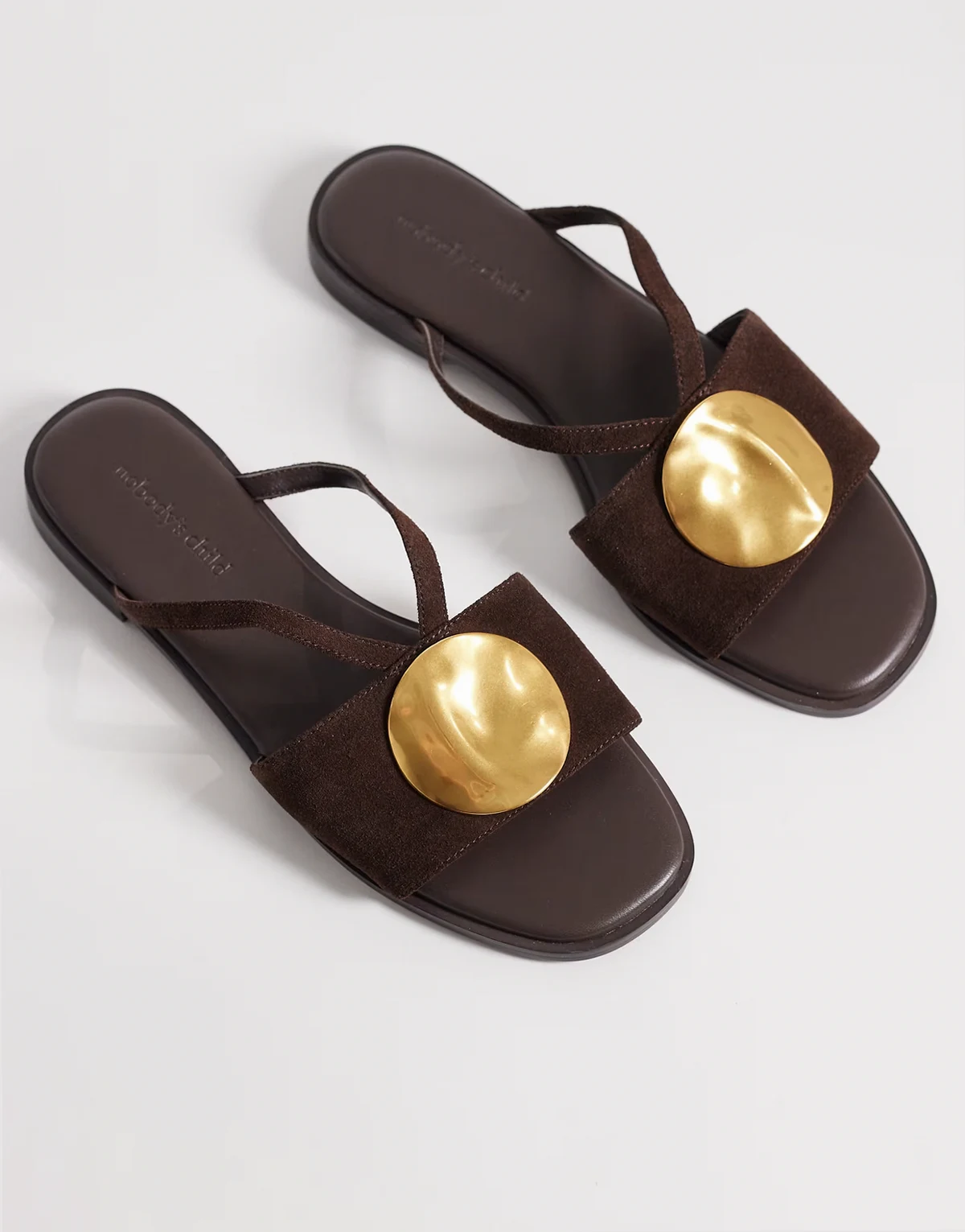 metal disc detailing slip on sandals in brown