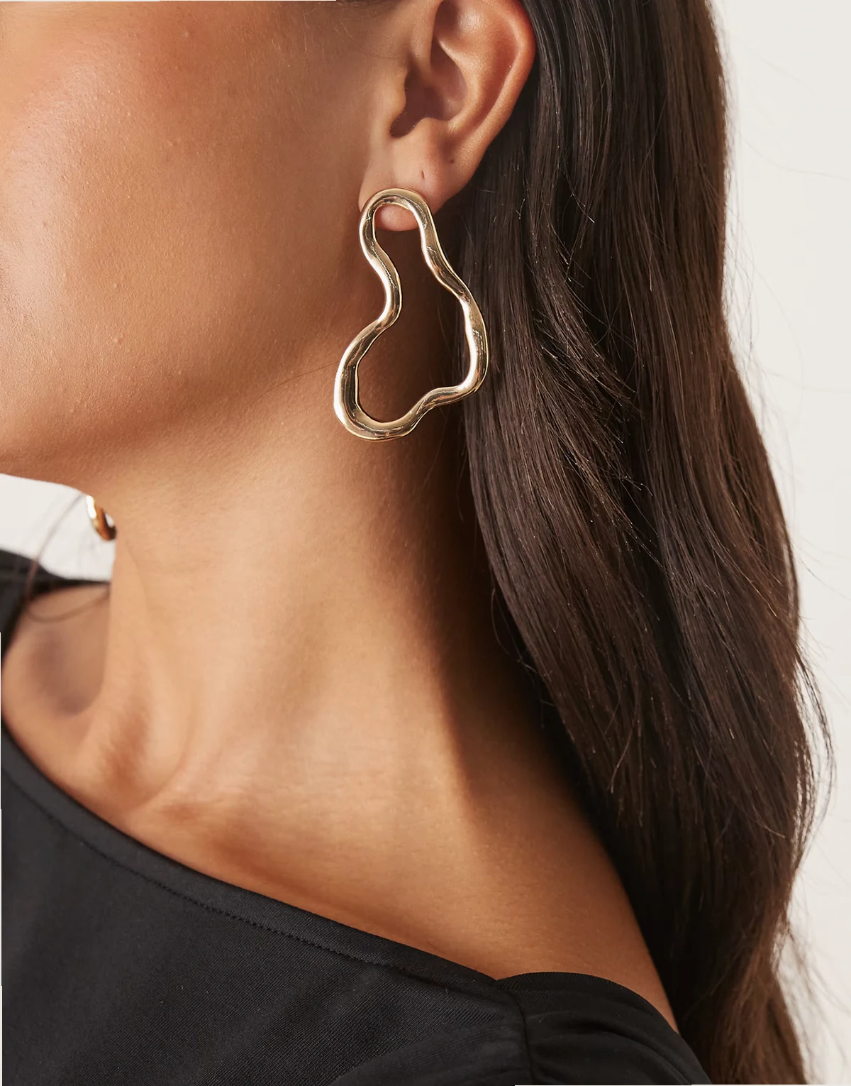 irregular molten stud earrings in gold