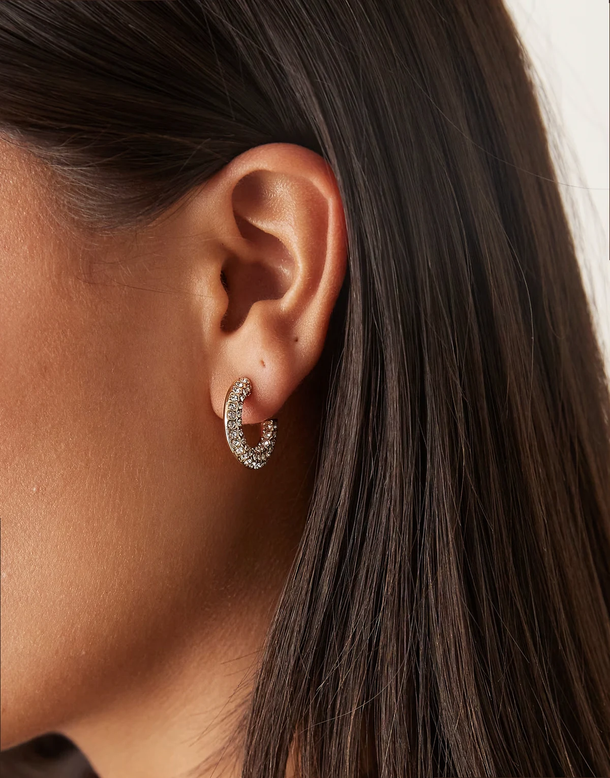 embellished hoop earrings in gold tone