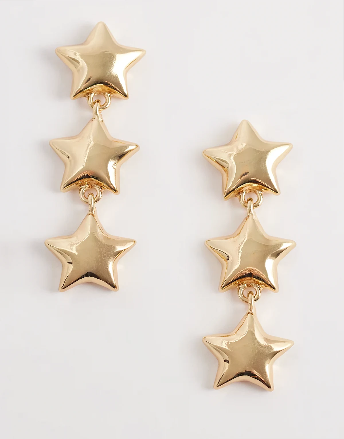 star drop earrings in gold