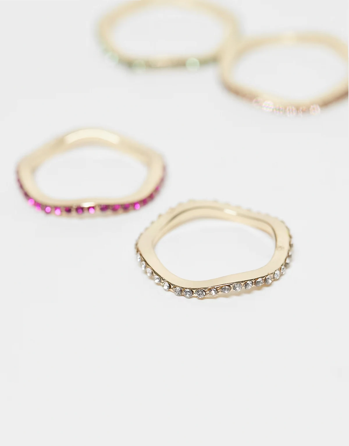 multi-pack dainty rings with colorful pave crystals in gold tone