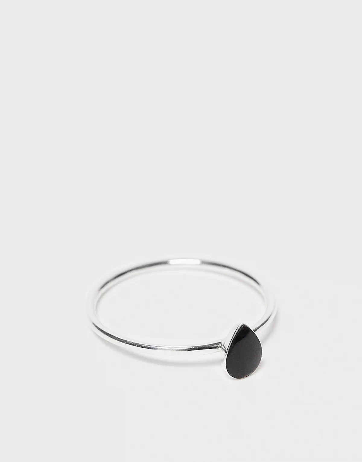 black gemstone ring in silver