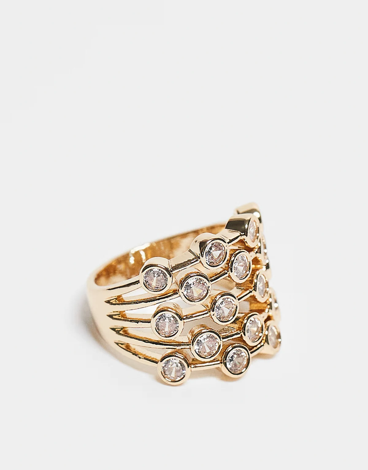 large caged ring with cubic zirconia stones set in gold tone