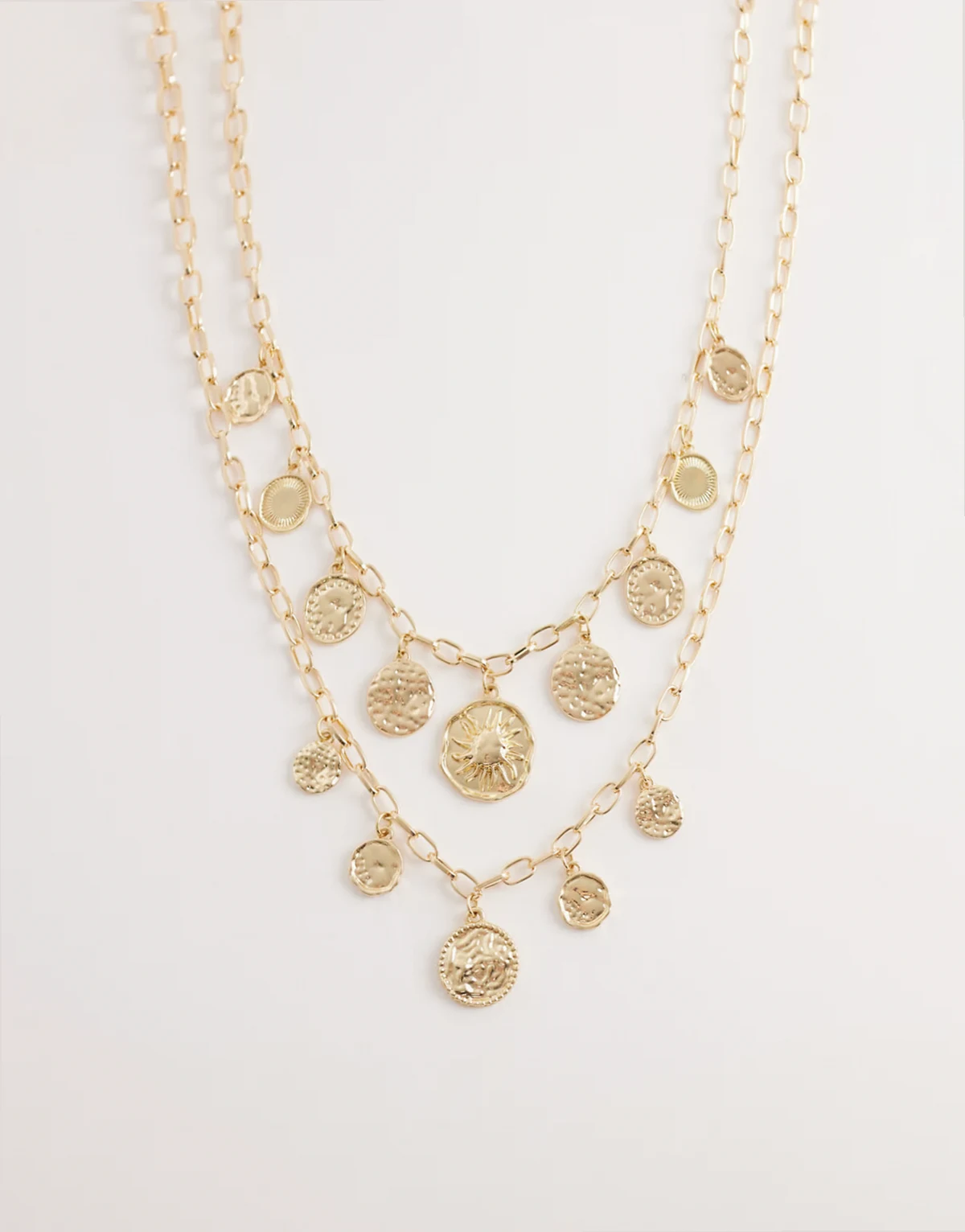layered faux coin necklace in gold tone