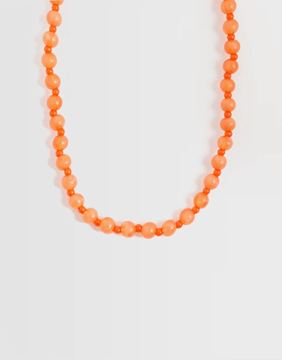 – Perlenkette in Orange