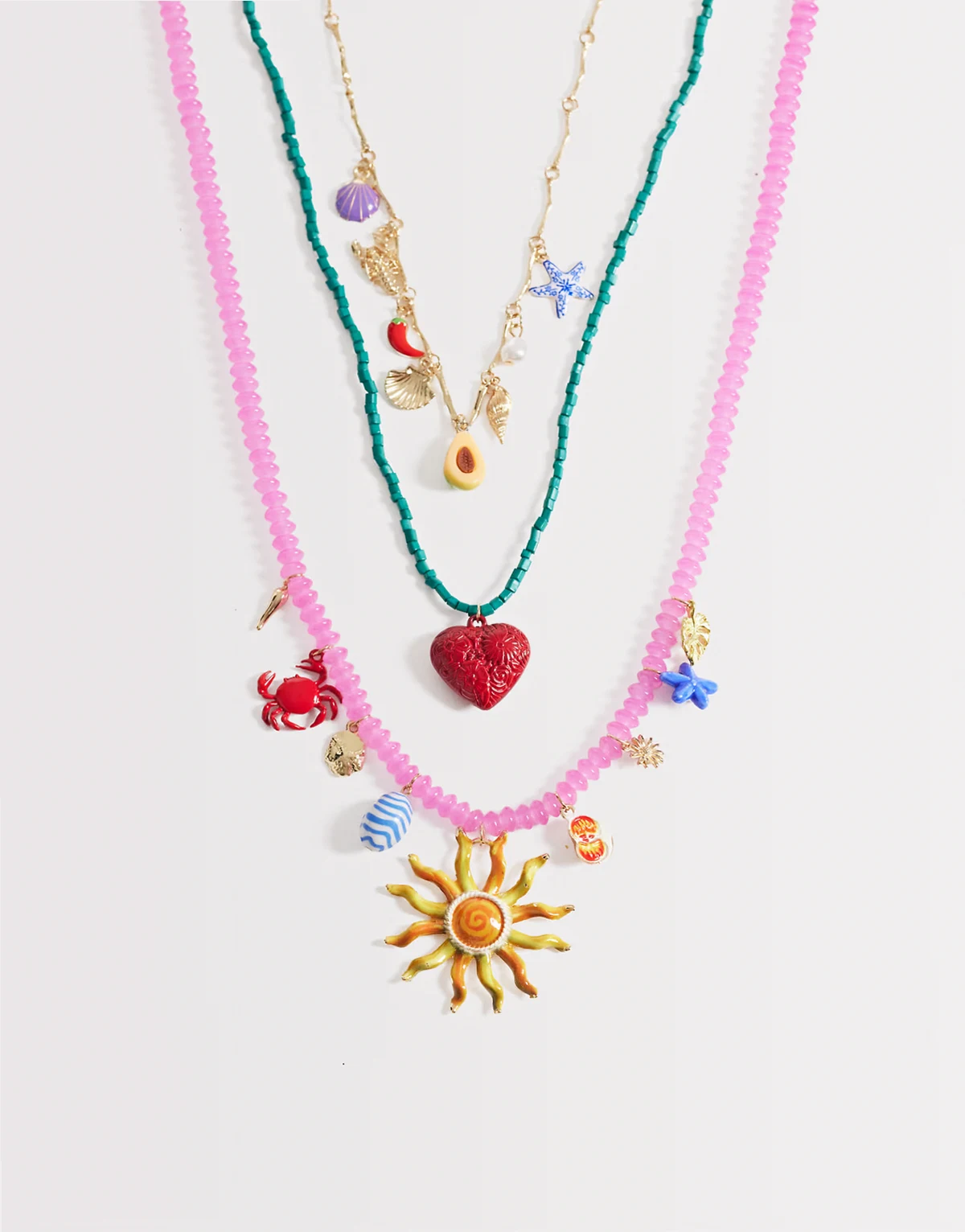 – Mehrreihige Perlenhalskette in Rosa mit Anhängern