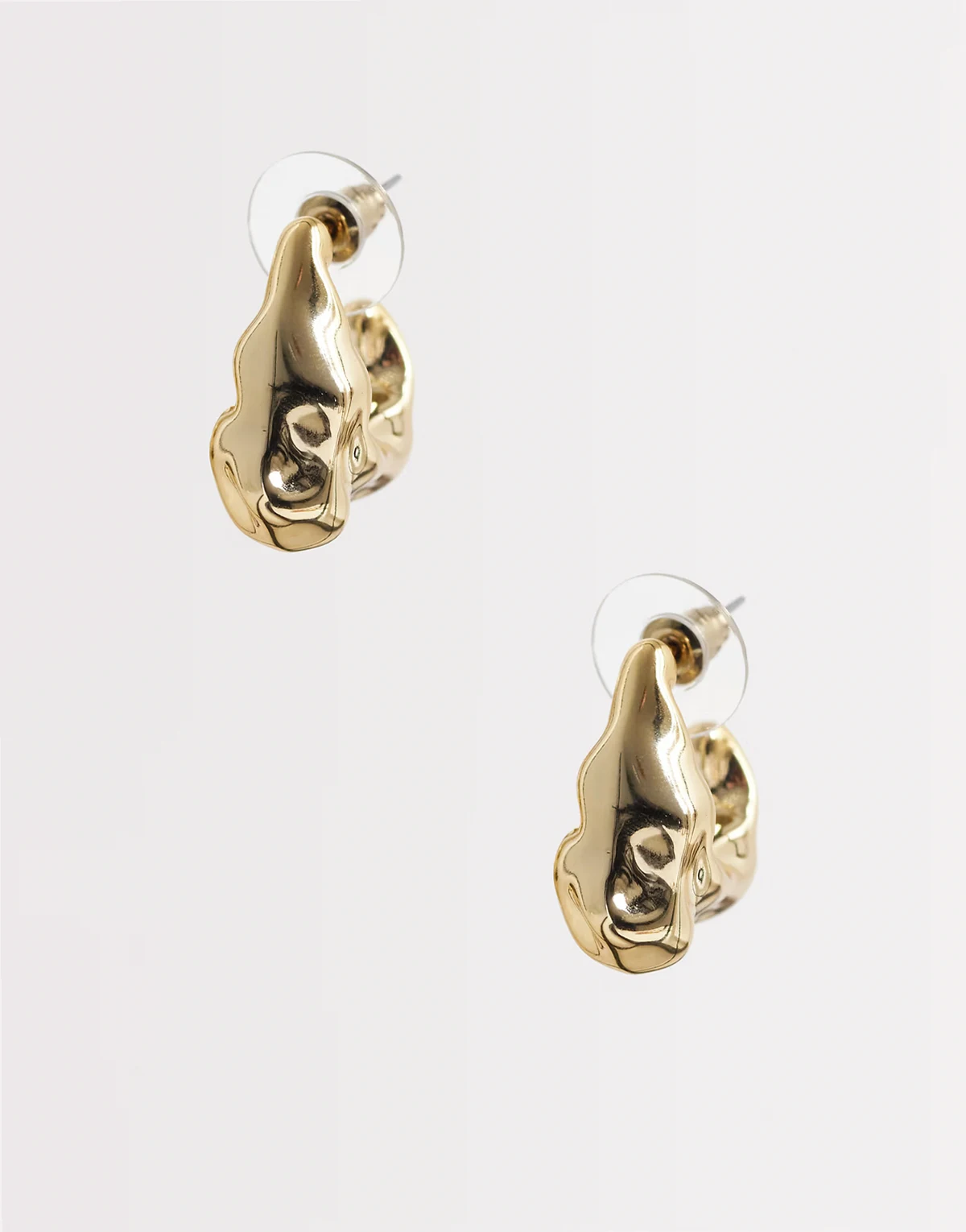 molten irregular hoop earrings in gold