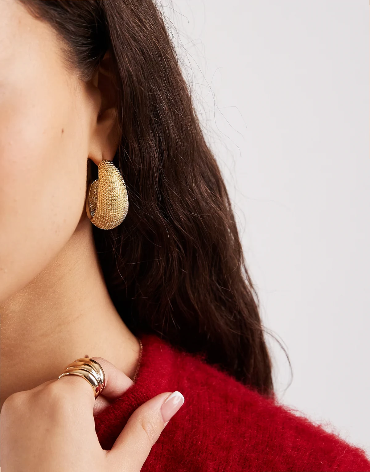 textured large hoop earrings in gold tone