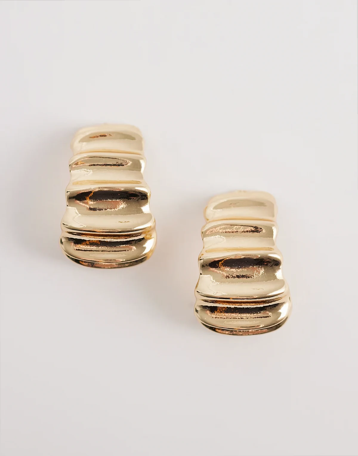ridged hoop earrings in gold