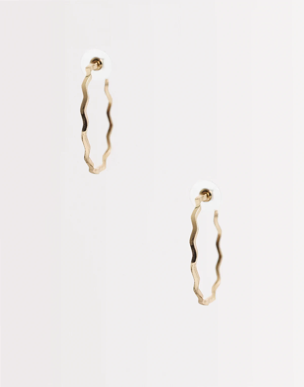 wave hoop earrings in gold