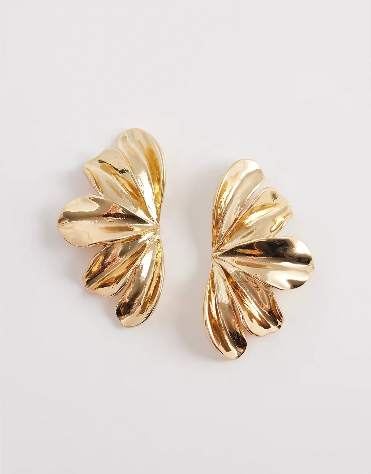 3D flower stud earrings in gold tone