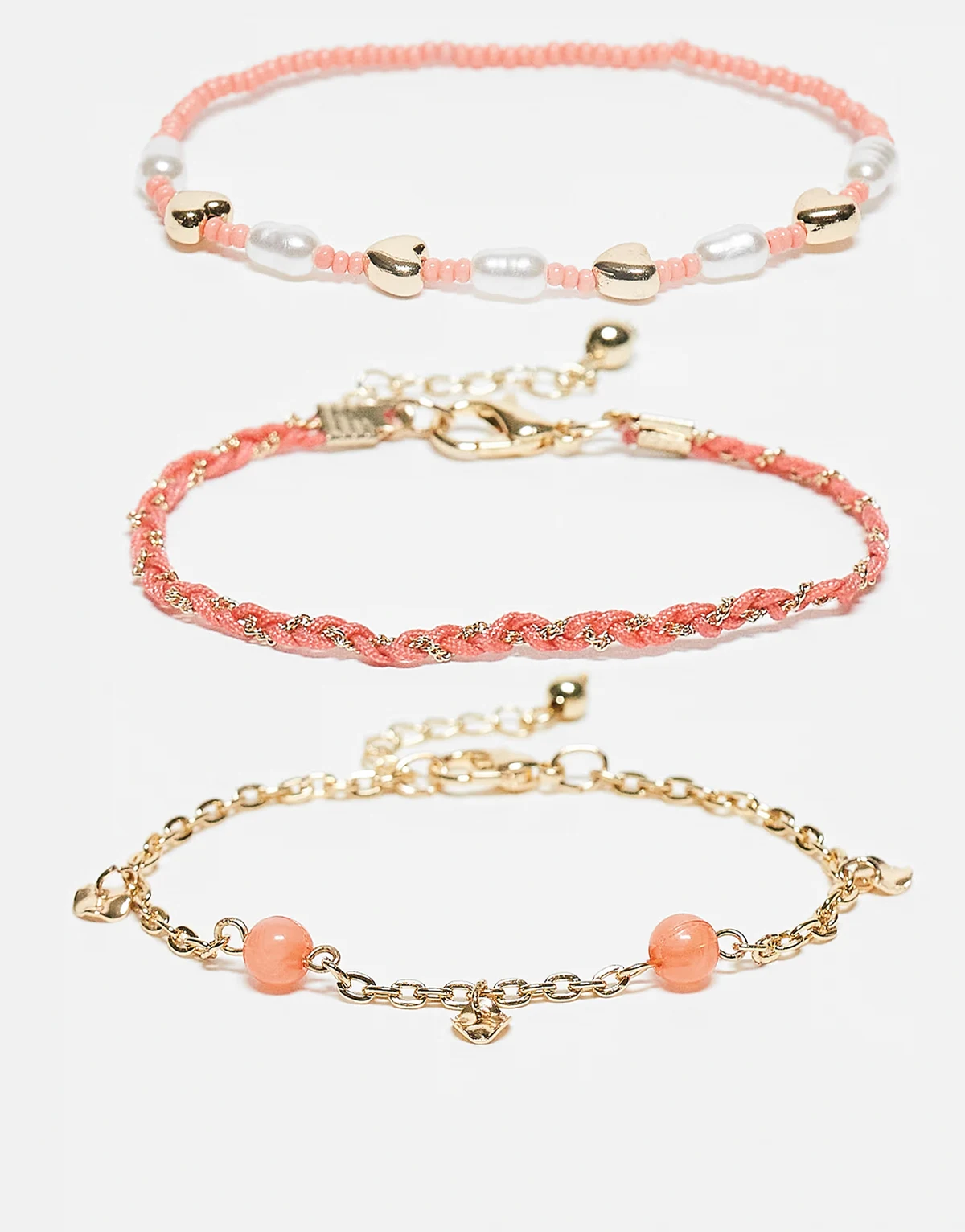 – Wielopak bransoletek z koralików w kolorach koralowym i złotym