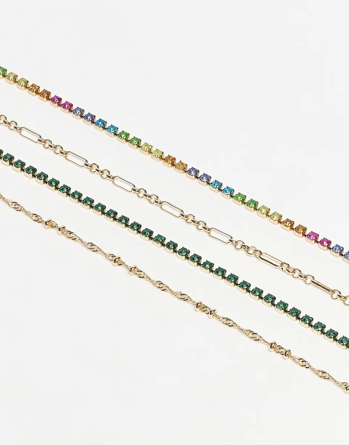 – Zestaw 4 delikatnych bransoletek w odcieniu złota z błyszczącymi kolorowymi kryształkami