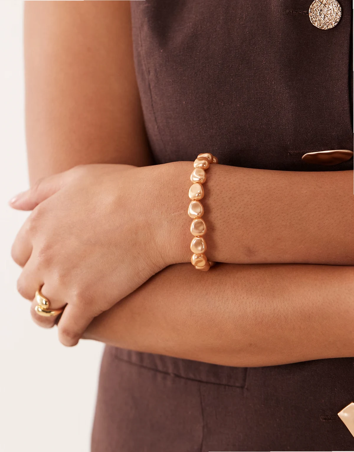 ASOS DESIGN Curve – Bransoletka w odcieniu złota ze sztucznymi perłami i zapięciem T-bar