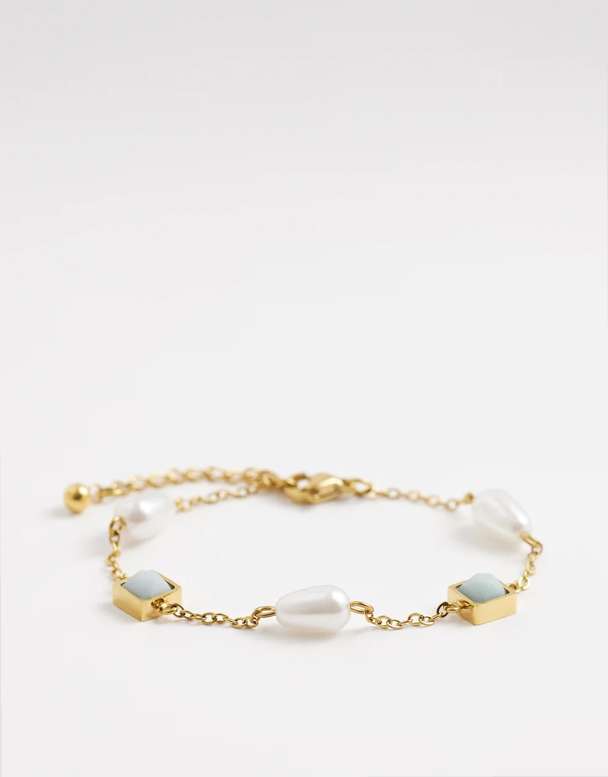 – Długie kolczyki ze stali nierdzewnej z niebieskim kamieniem i perłami