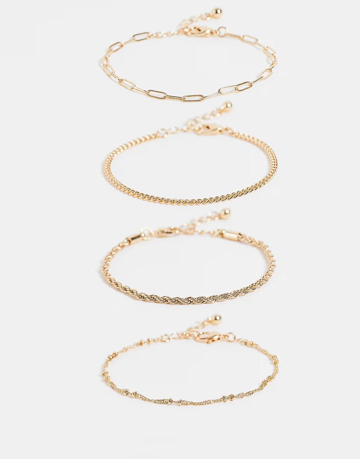 – Zestaw 4 bransoletek łańcuszkowych w kolorze złota