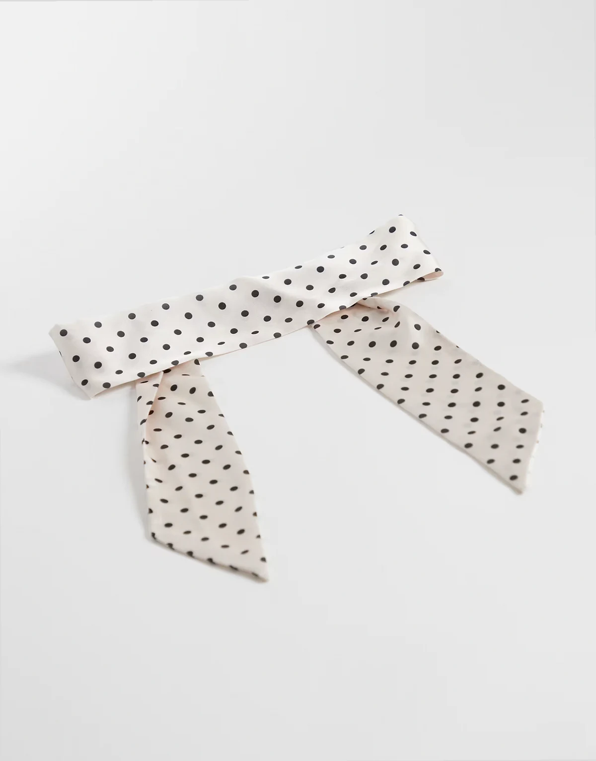 headband with tie detail in black and white polka-dot print