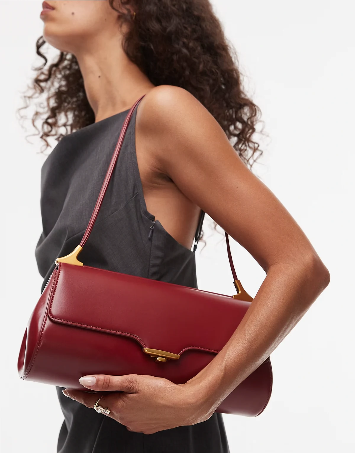 Eloise clean shoulder bag with gold tone hardware in burgundy