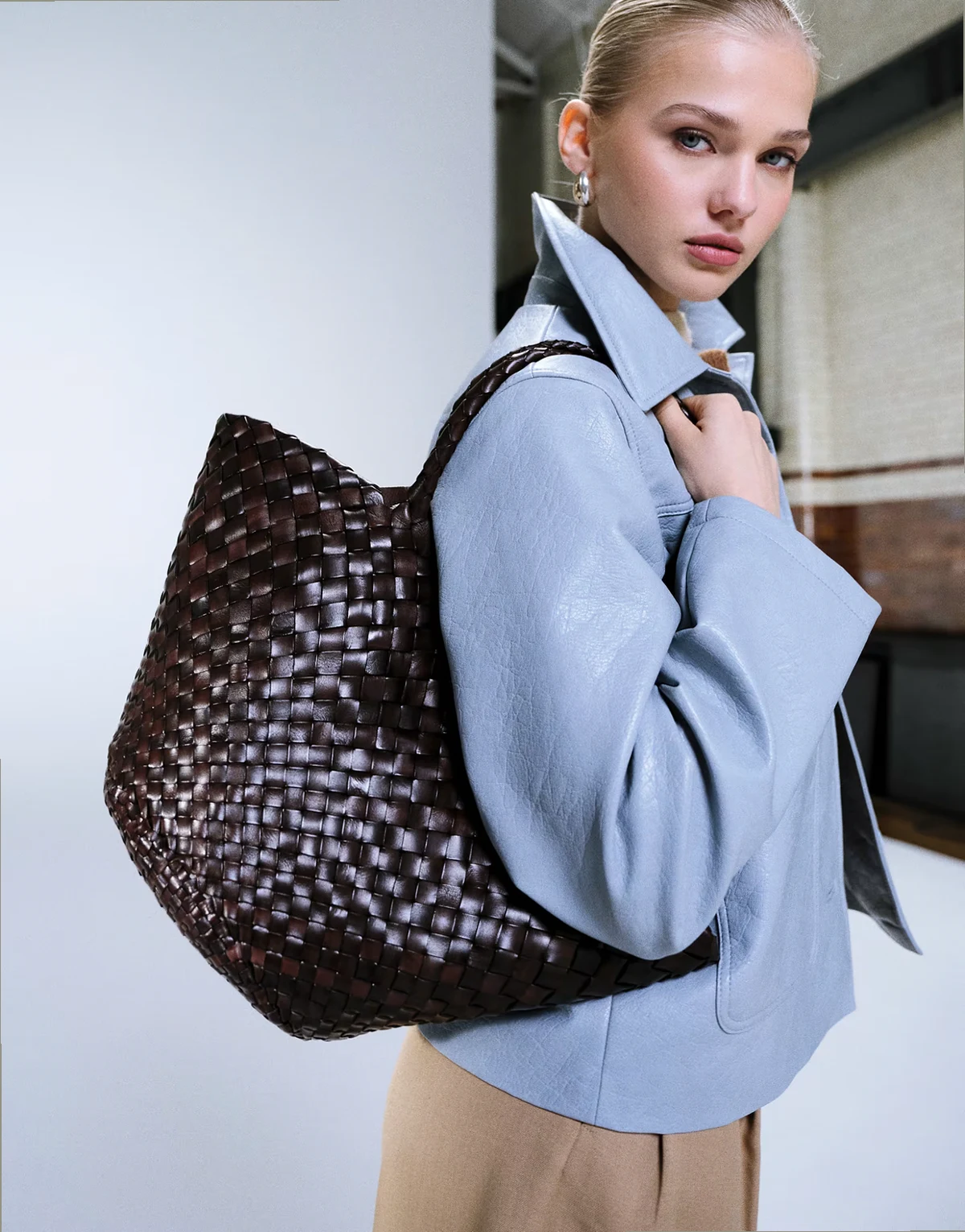 Egola woven leather shoulder basket bag in dark brown