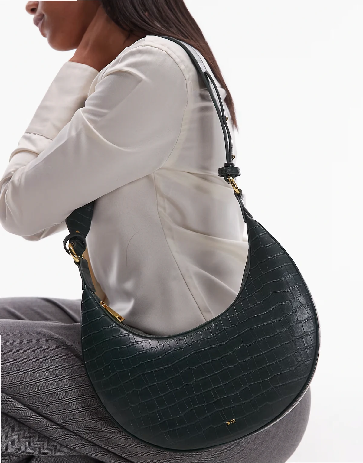 Carly crossbody saddle bag in dark green