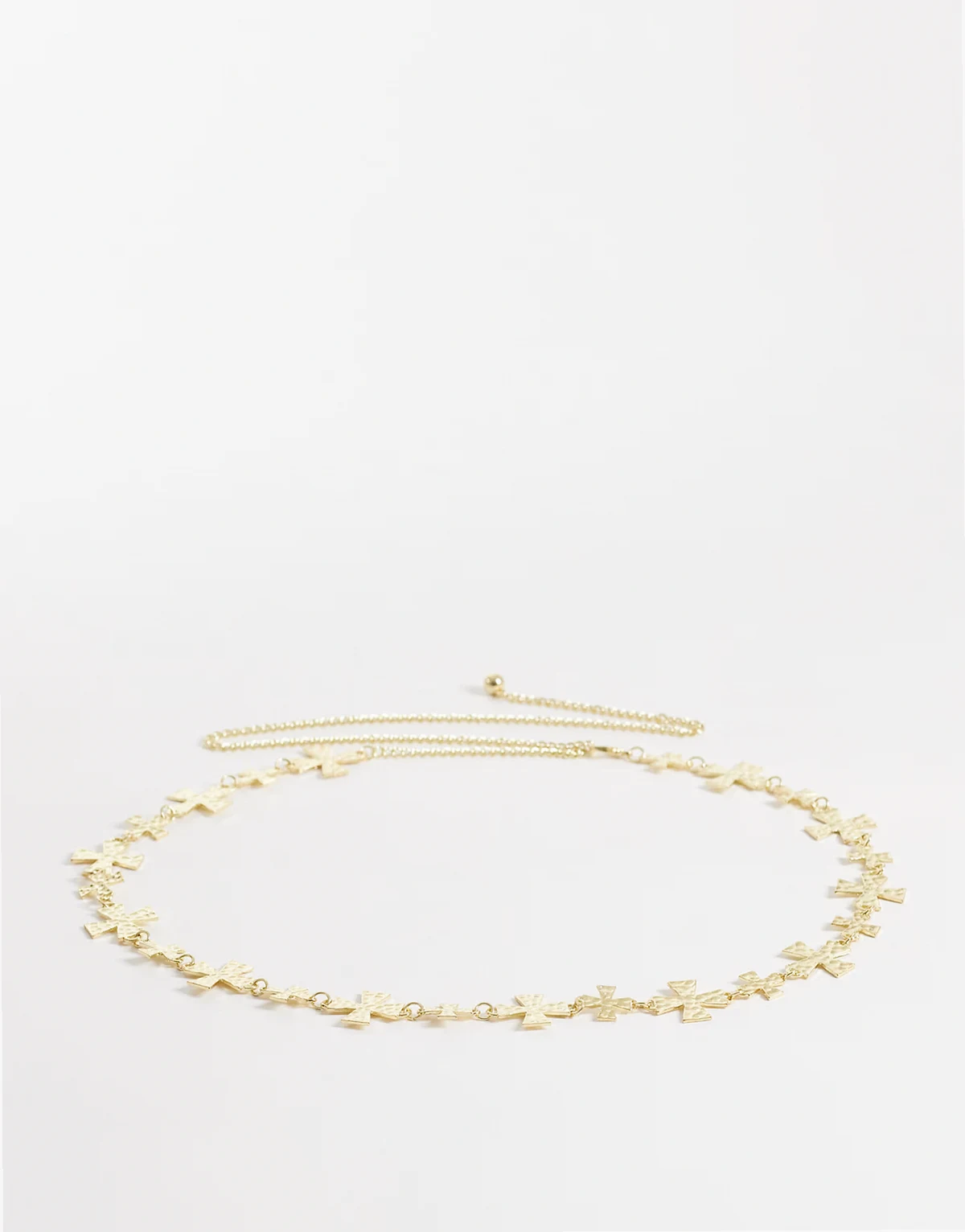 curves chain belt with crosses in gold