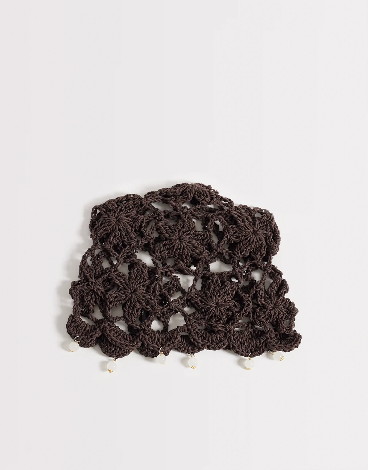 crochet cap in dark brown