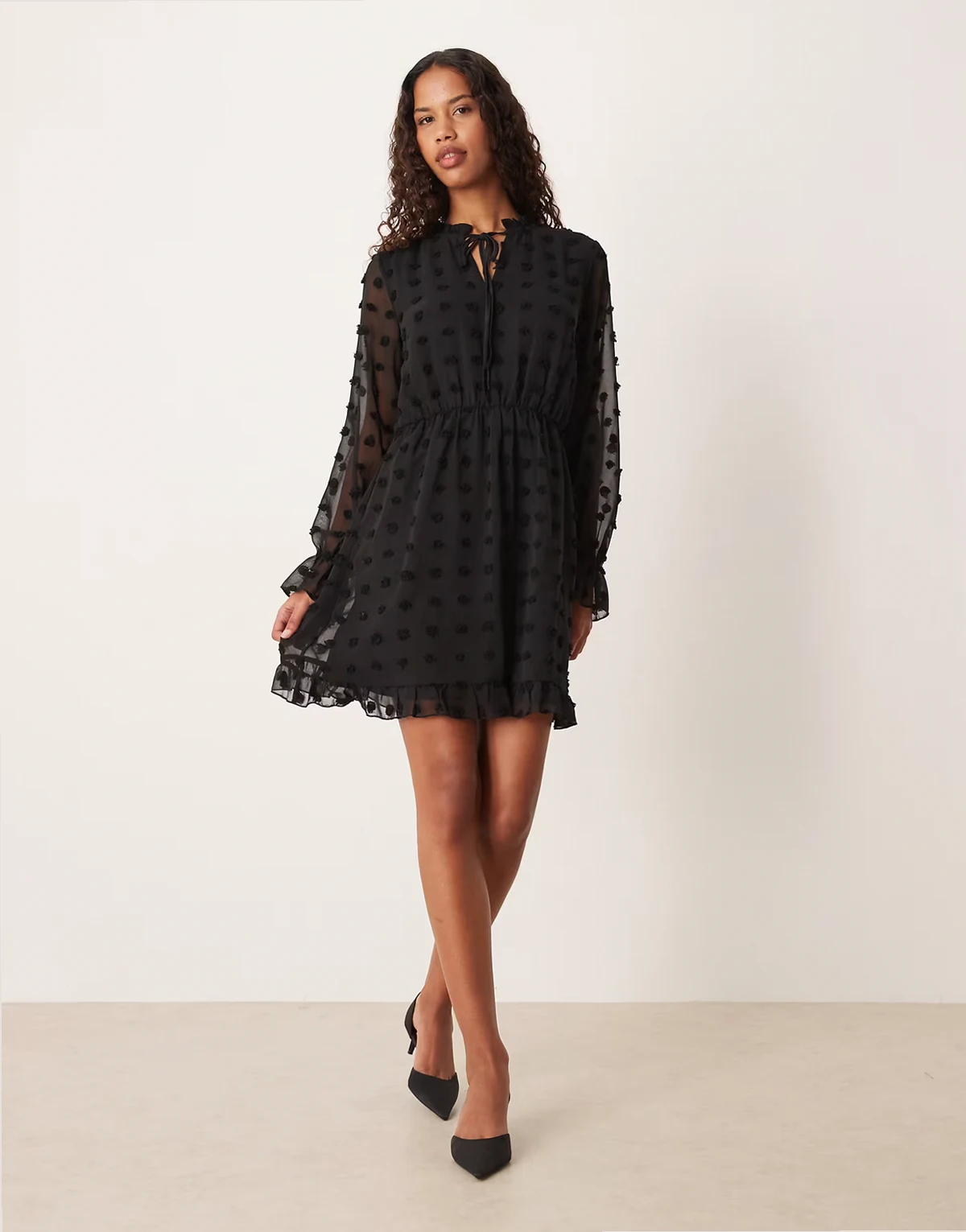 textured mesh long sleeve mini dress in black