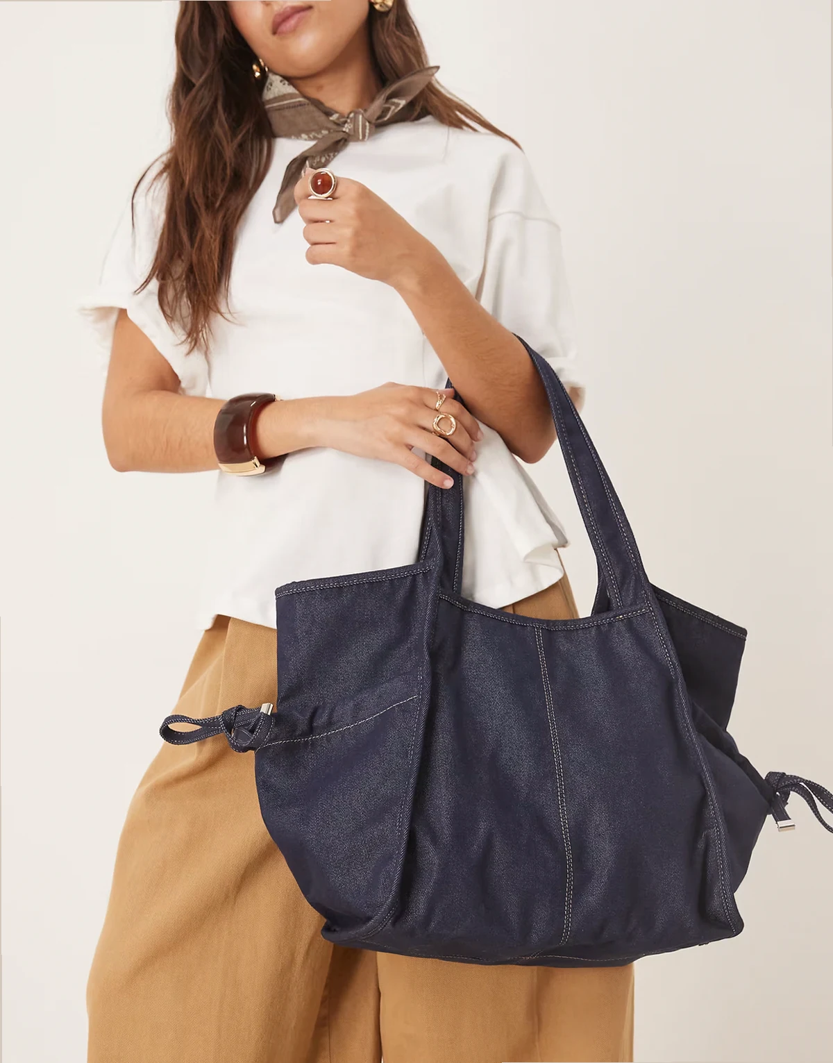denima laurel tote bag with tie detail in navy denim blue