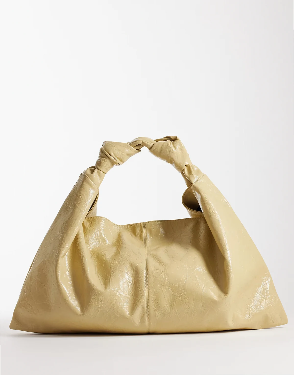 – Jasnożółta fakturowana torba typu tote o bardzo luźnym kroju