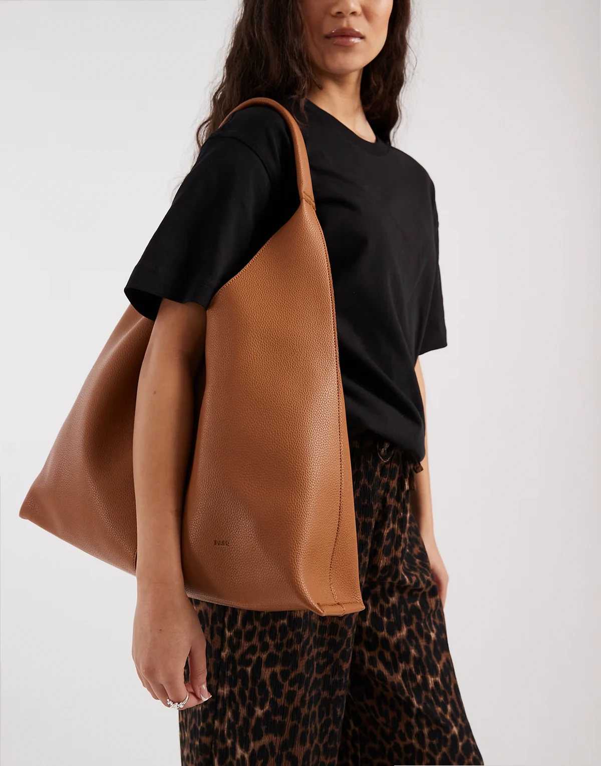 A-Line soft paneled shoulder bag in tan