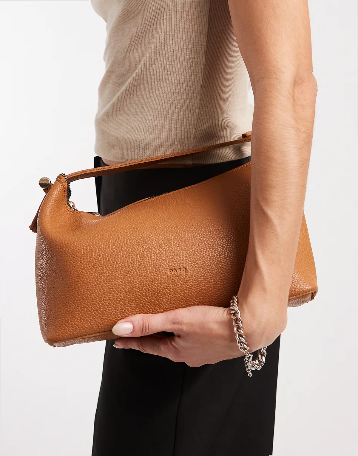 soft zip top grab bag with crossbody strap in tan