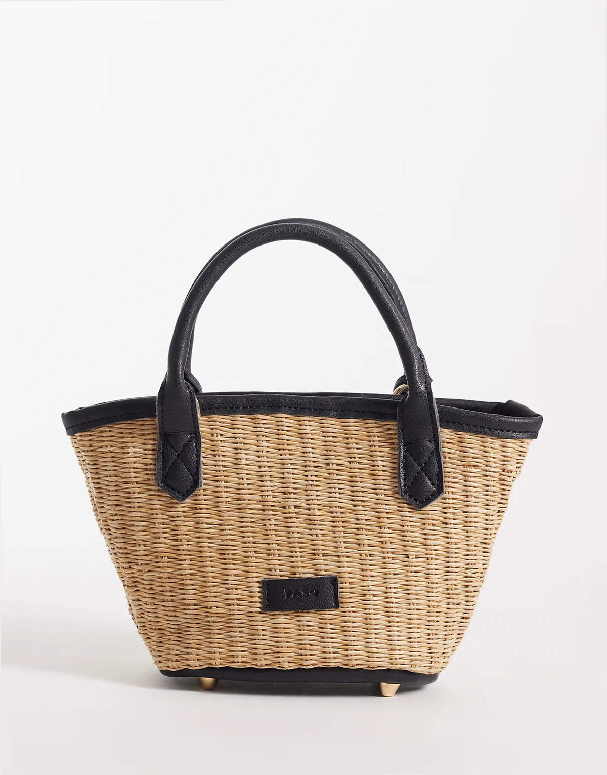 mini straw tote bag with crossbody strap in black and beige